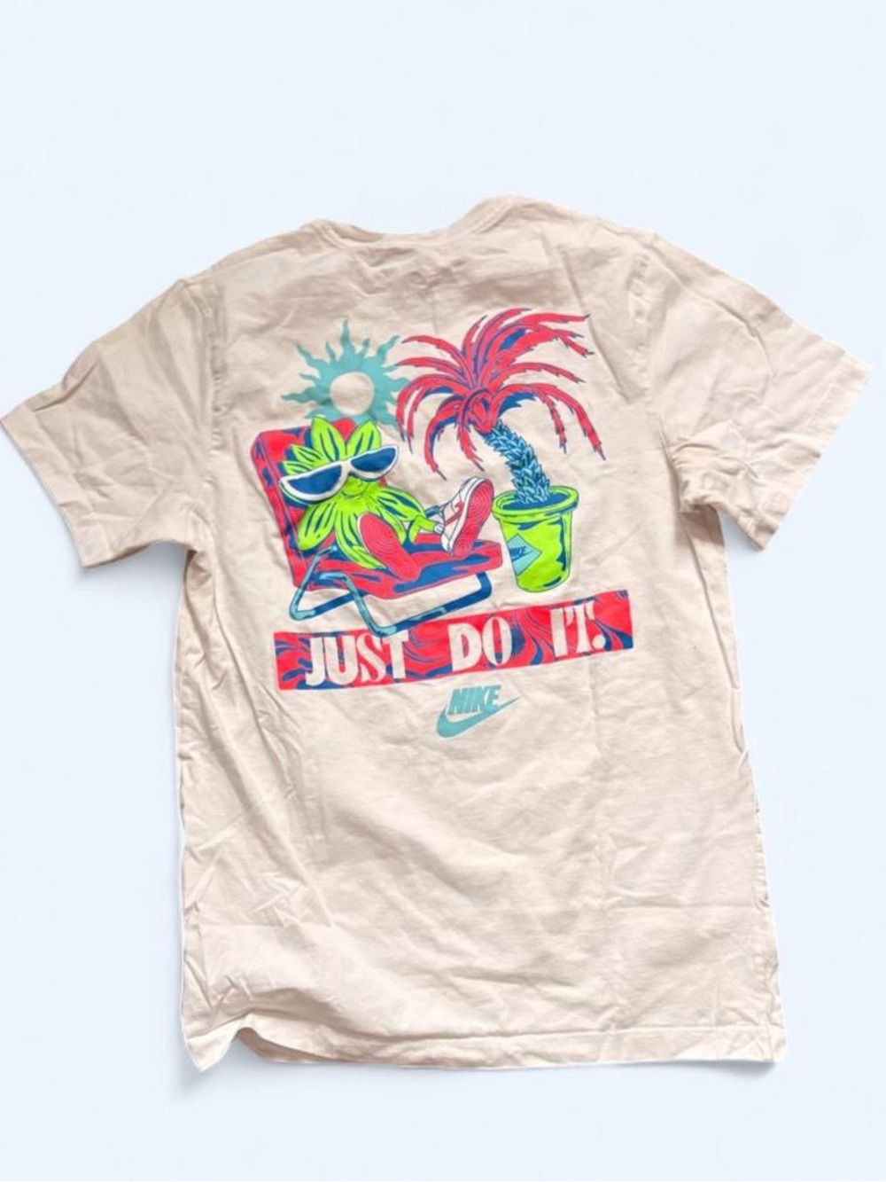 Nike Beige Short-Sleeve Tee with Neon Tropical Graphic